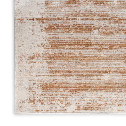 Rectangular beige area rug with tan brush-stroke stripes and distressed texture.
