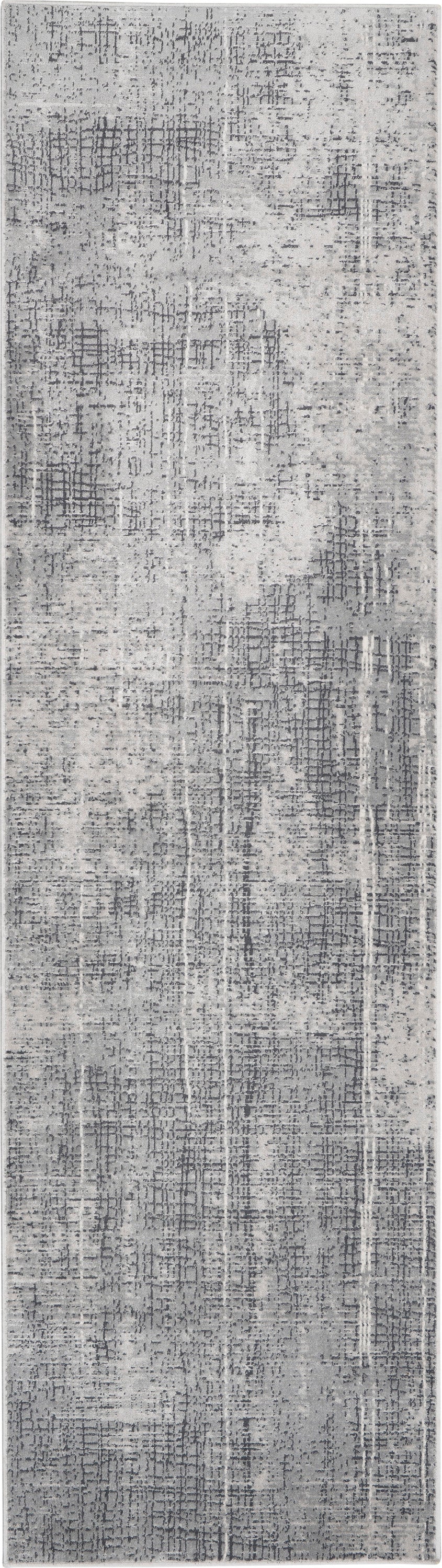 Grey distressed abstract runner rug with a muted grid-like pattern of dark and light tones.