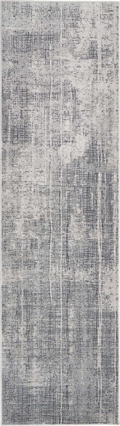 Grey distressed abstract runner rug with a muted grid-like pattern of dark and light tones.