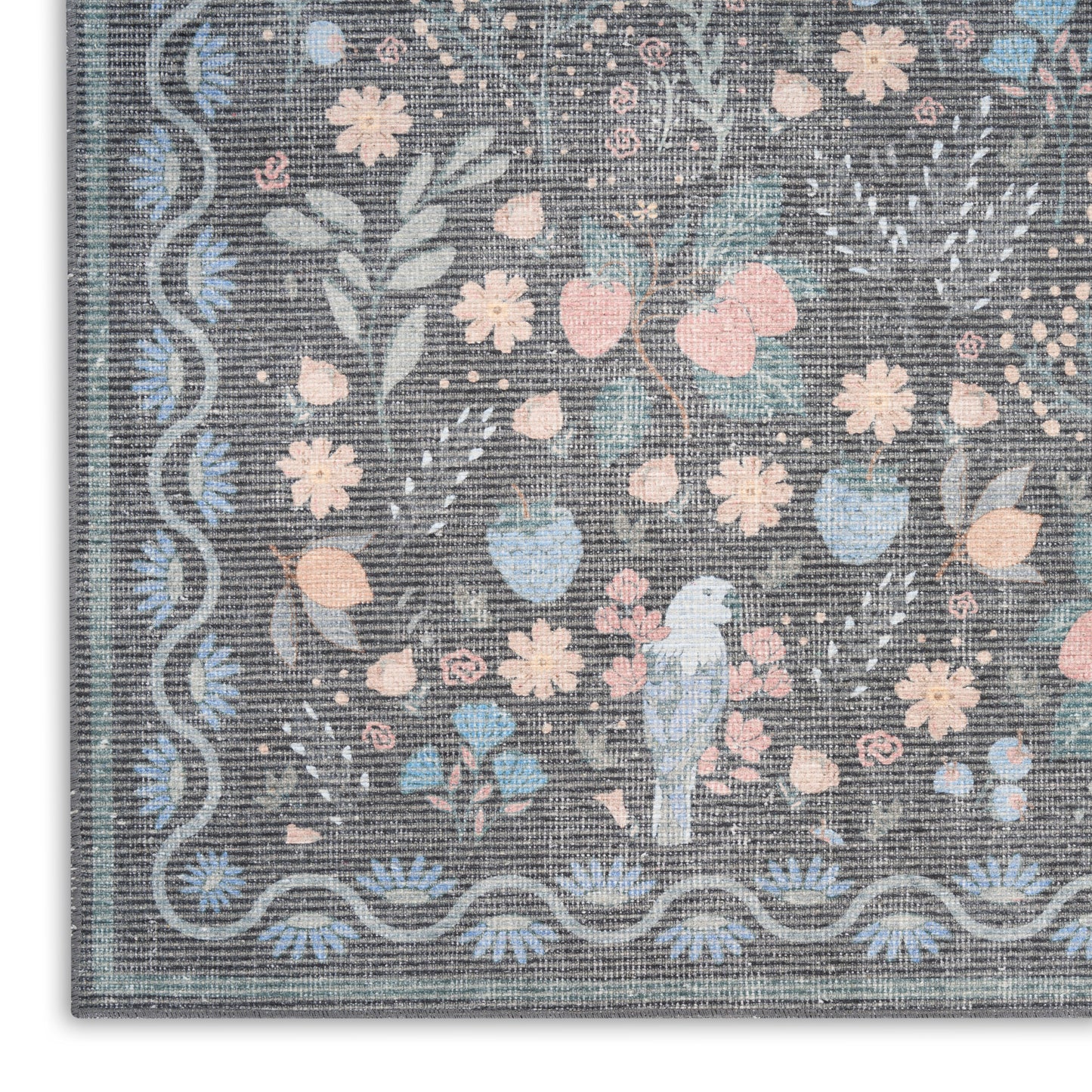 Pastel floral tapestry rug with blue-gray field, bird motif, and scalloped border; woven decorative throw.