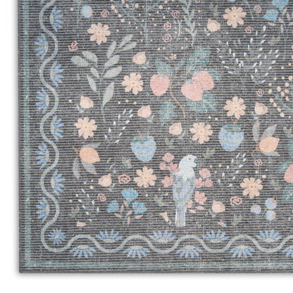 Pastel floral tapestry rug with blue-gray field, bird motif, and scalloped border; woven decorative throw.