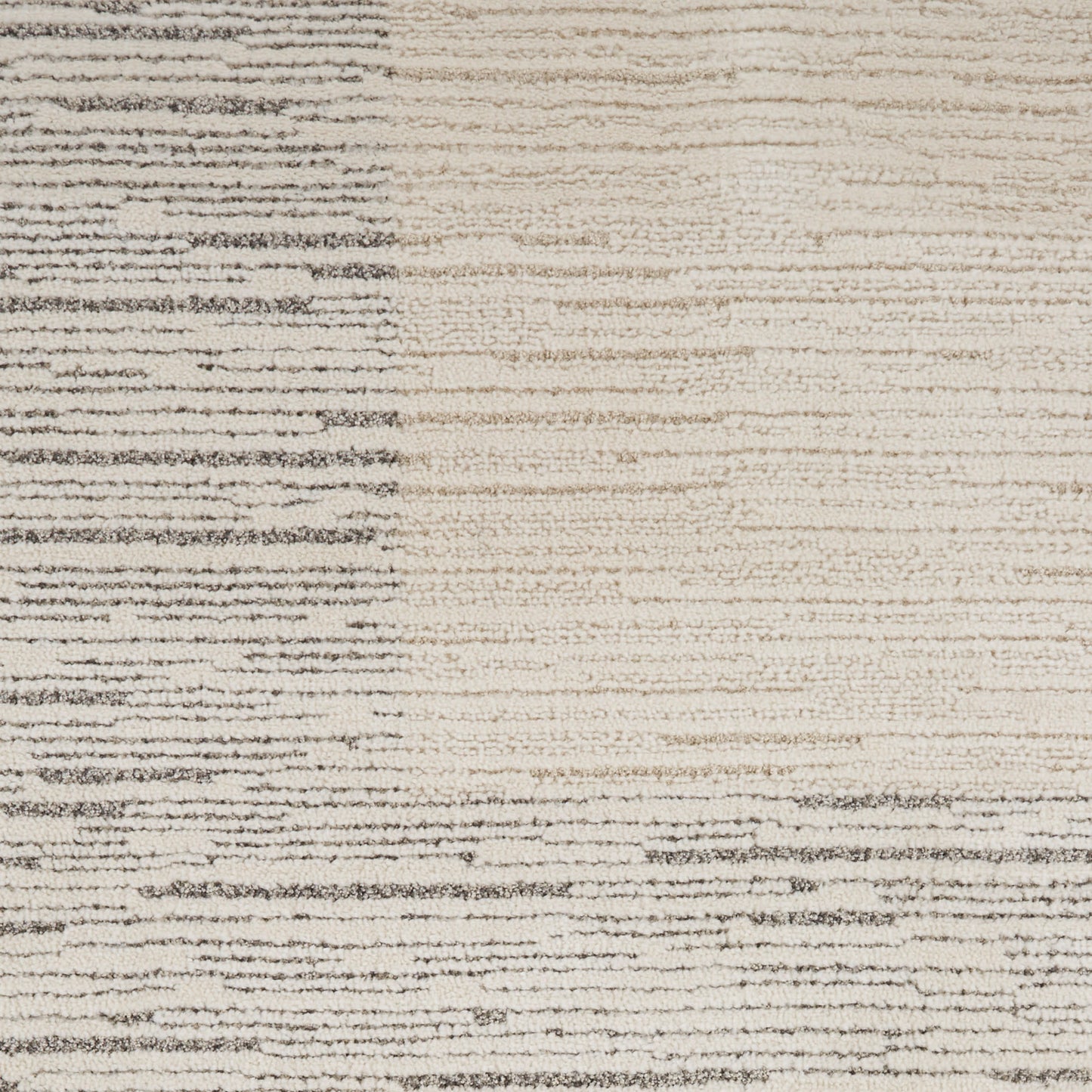 Beige and gray striped rectangular rug (9' x 12') with brushed horizontal lines and soft textured pile.