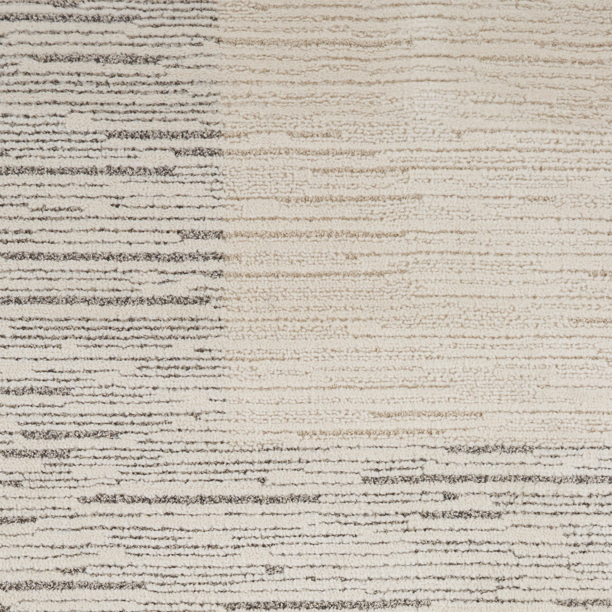 Beige and gray striped rectangular rug (9' x 12') with brushed horizontal lines and soft textured pile.
