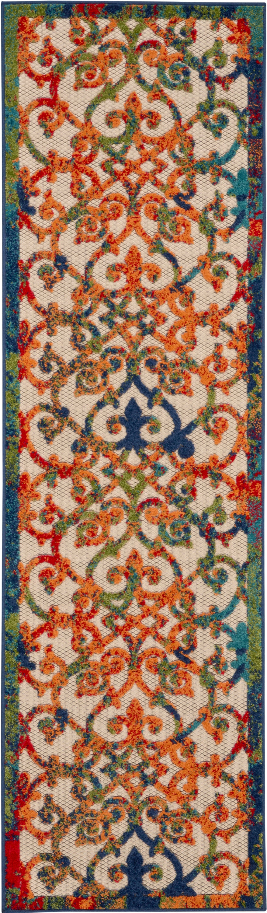 Vibrant oriental-style runner rug with orange, teal and green scrolling motifs on beige, bordered in dark blue.