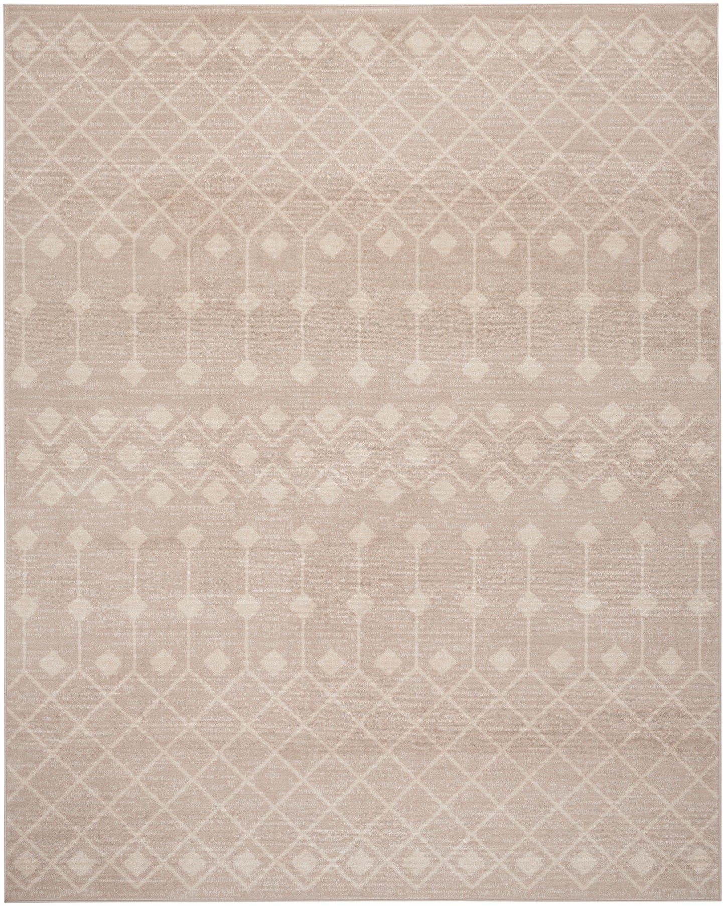 Soft blush beige woven area rug with white diamond lattice pattern and geometric borders.