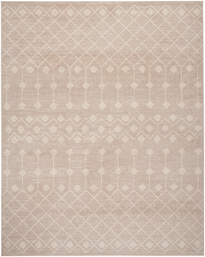 Soft blush beige woven area rug with white diamond lattice pattern and geometric borders.