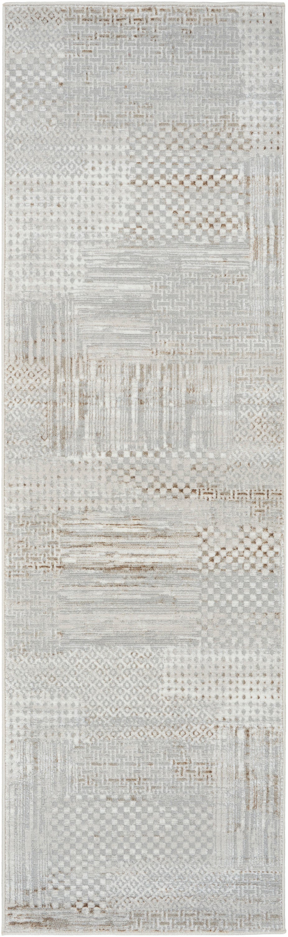 8' long patchwork rug runner in neutral cream, ivory and taupe tones with varied woven textures.