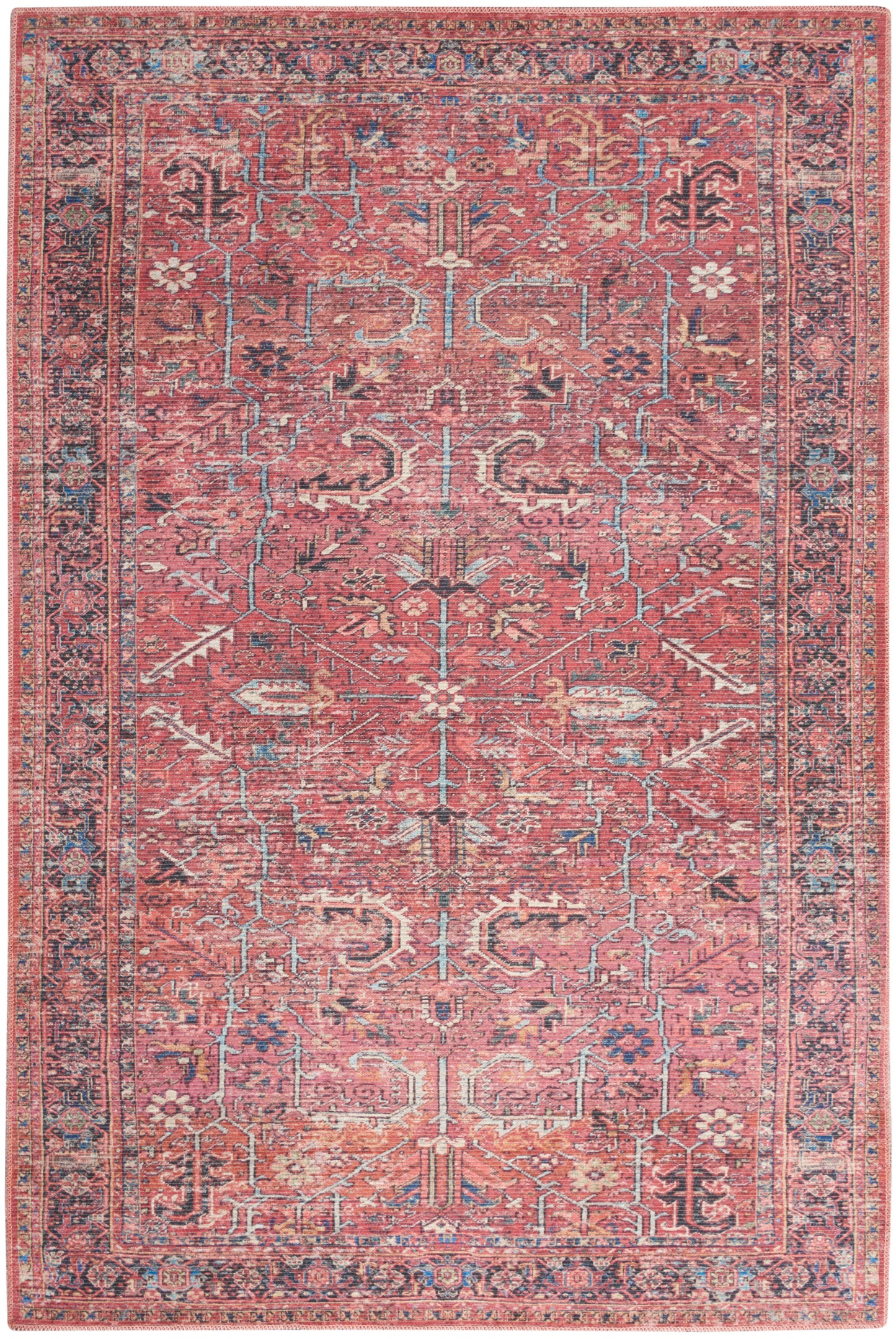 Pink oriental rug with blue and ivory floral vines and geometric motifs, bordered by a detailed multi-colored border.