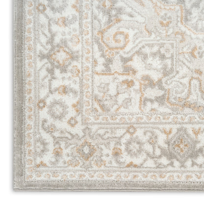 Neutral-toned oriental rug with ivory, gray and pale tan accents; ornate border and floral medallion pattern.