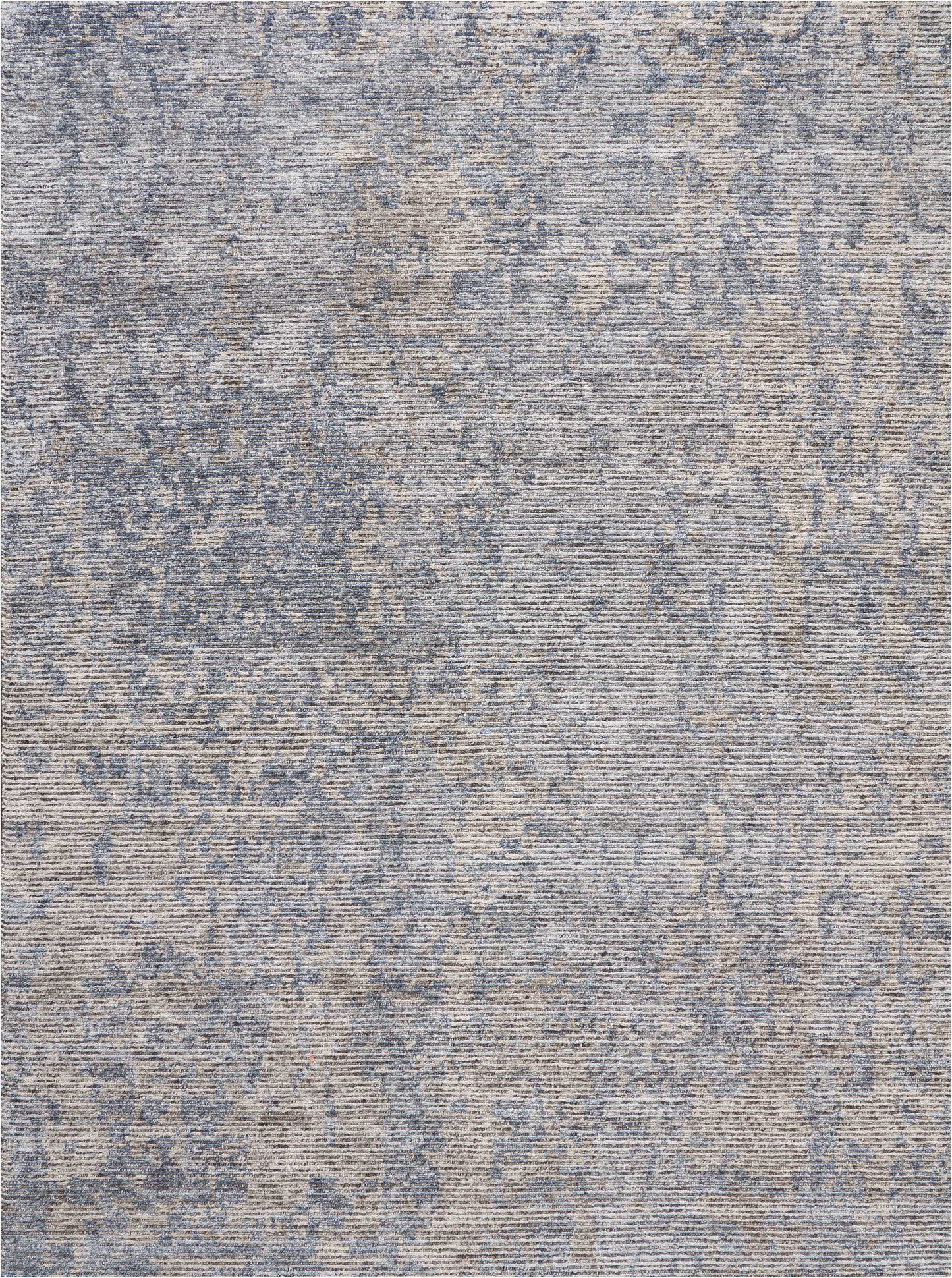 Blue and beige distressed-pattern area rug with abstract vintage print and woven texture.