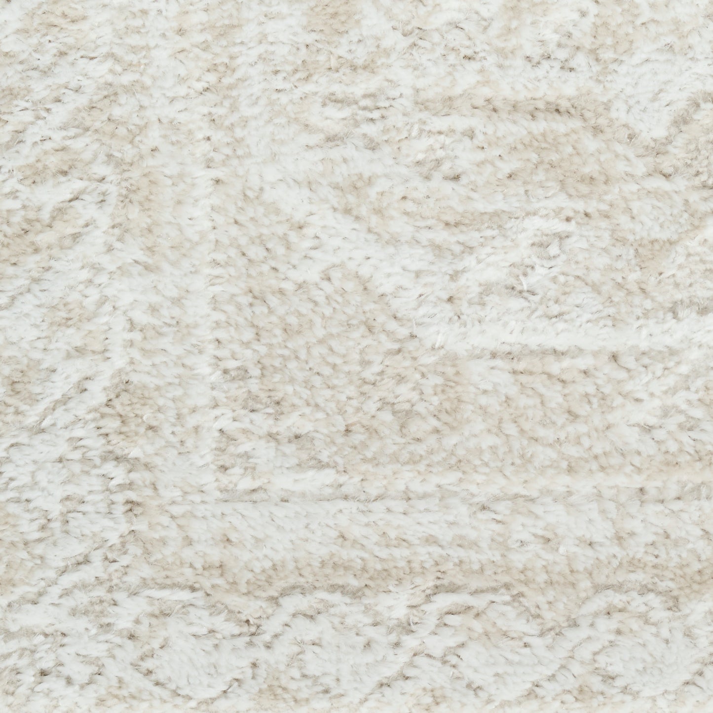 Cream shag rug with plush ivory pile and soft textured surface for cozy rooms.