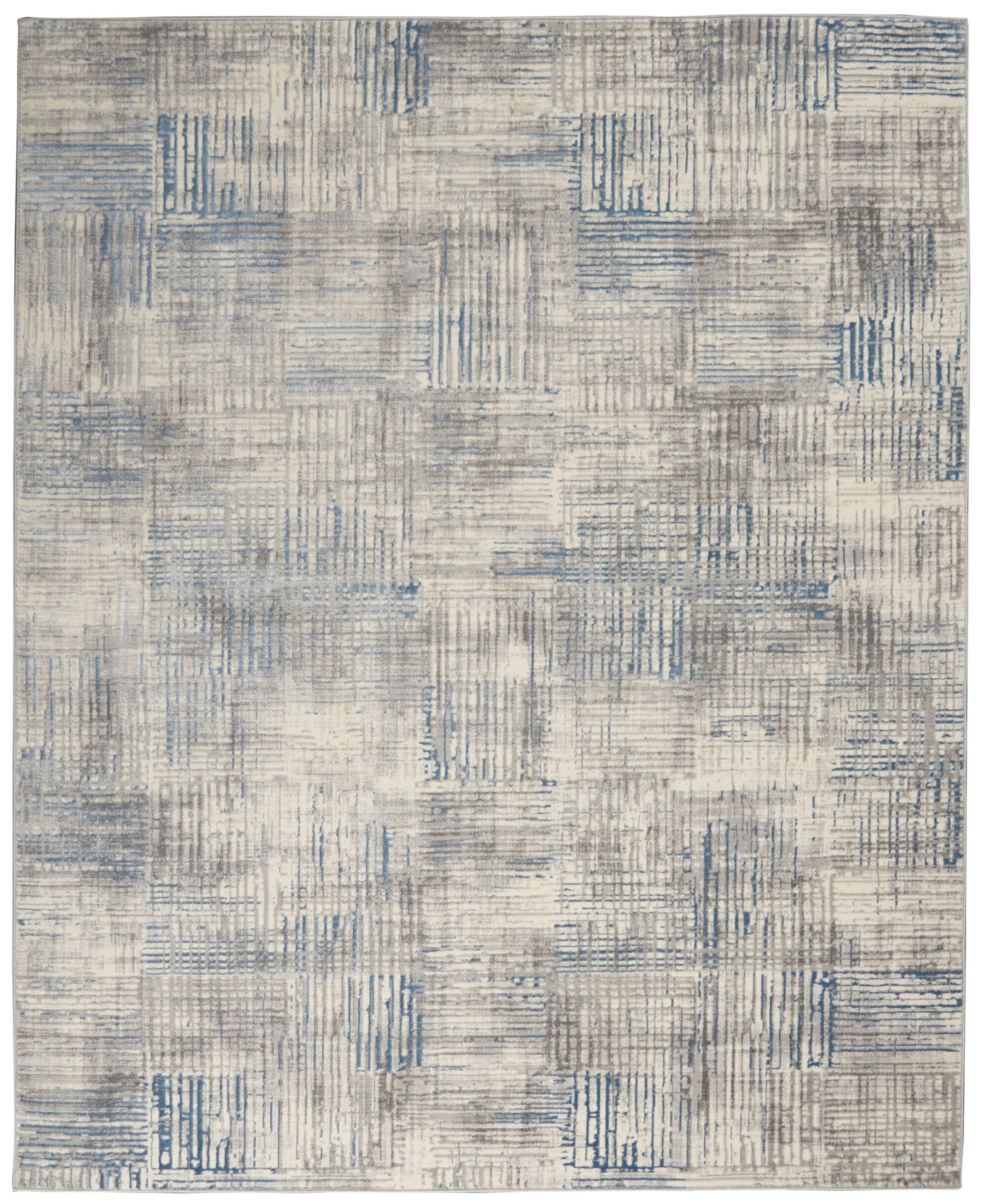 Blue-gray patchwork area rug with distressed linear block patterns in beige tones.