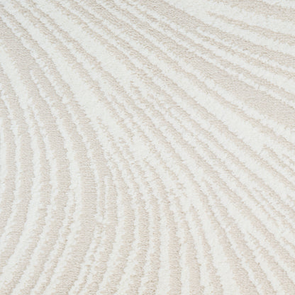 Cream and beige textured rug with tan, wavy striped pattern and soft pile for modern living spaces.