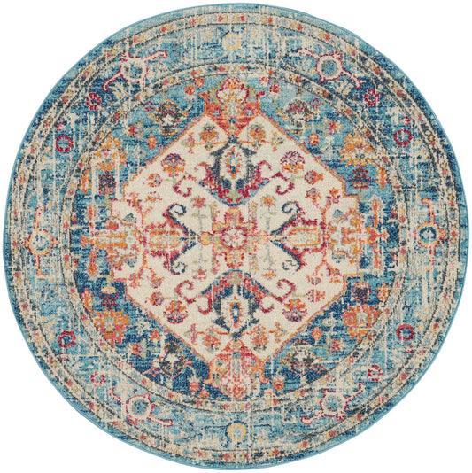 Round oriental rug with turquoise border and ivory center, ornate floral damask pattern in pink, teal and orange.