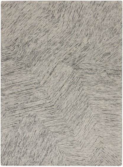 Grey textured rug with subtle herringbone pattern and soft plush pile.