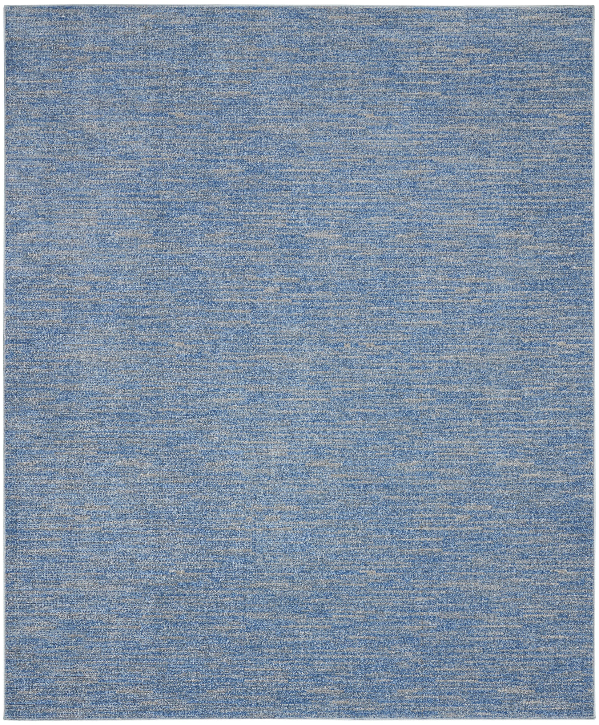 Blue heathered area rug with subtle variegated blues and soft woven texture, modern living room floor covering.