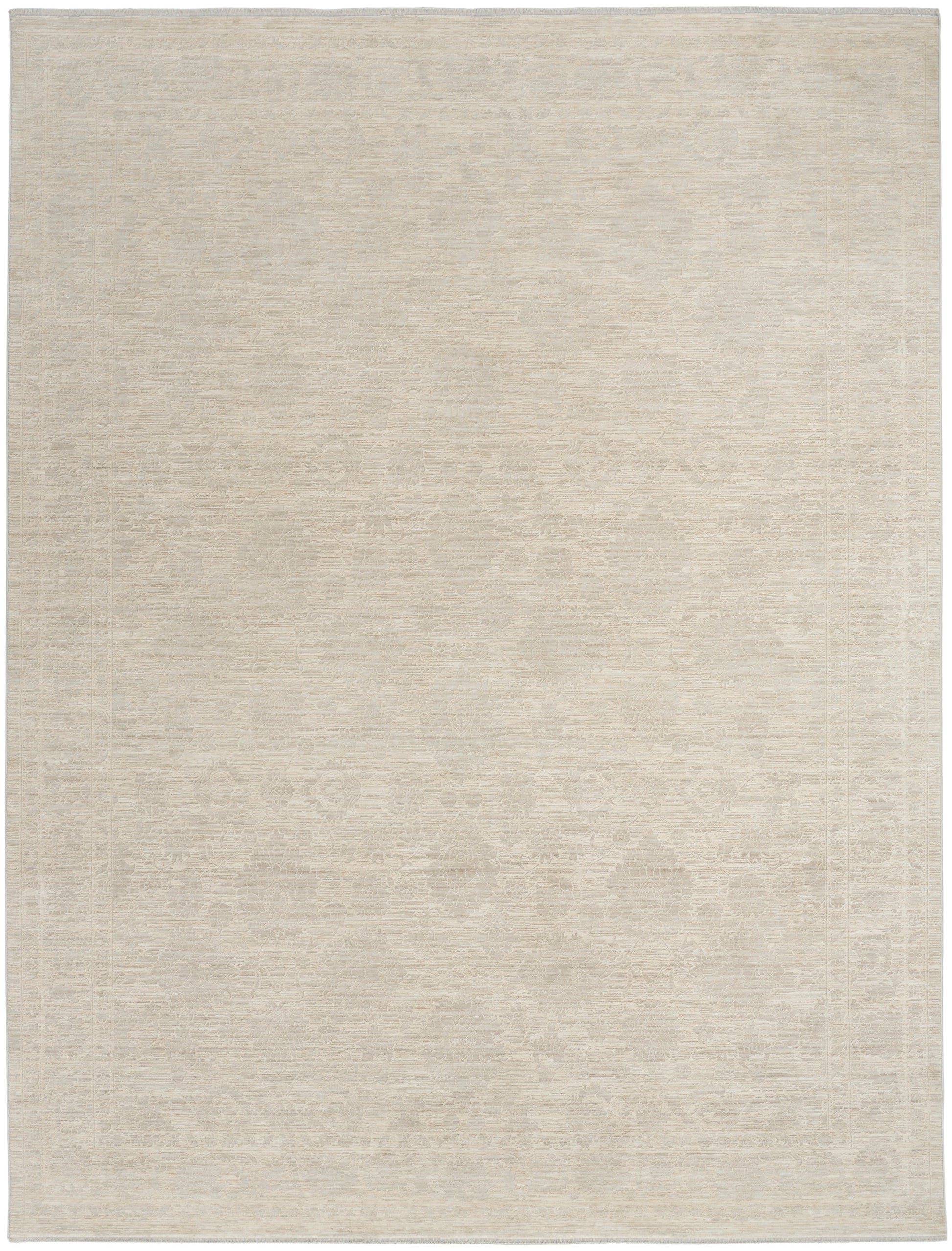 Neutral beige rectangular area rug with a subtle distressed motif and soft woven texture.