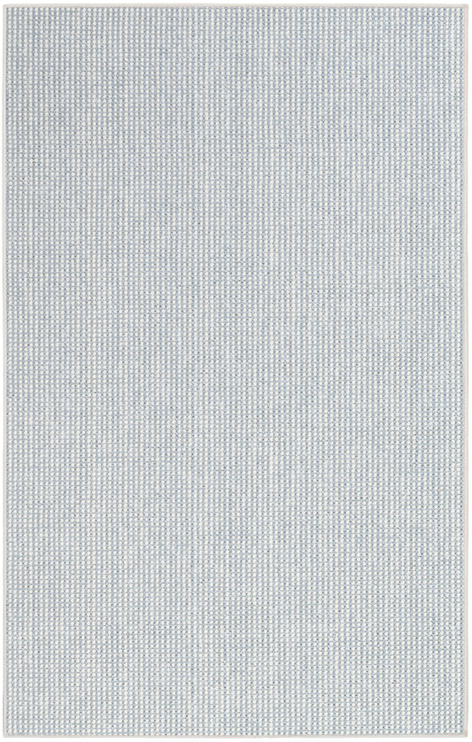 Light blue speckled flat-weave rug with subtle white grid and beige border.