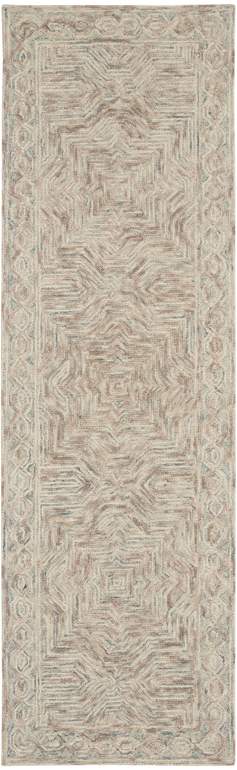 Neutral area rug with blush pink and pale blue-gray geometric stepped motif and ornate border.