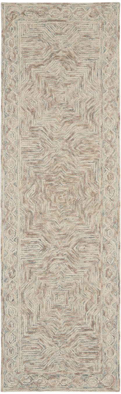 Neutral area rug with blush pink and pale blue-gray geometric stepped motif and ornate border.