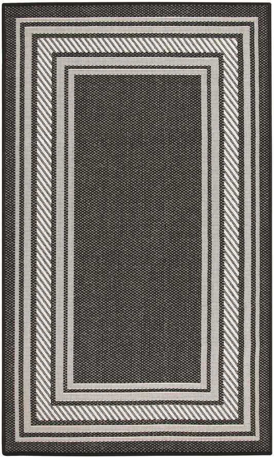 Black and white rectangular area rug with layered borders and diagonal-striped outer frame modern geometric design