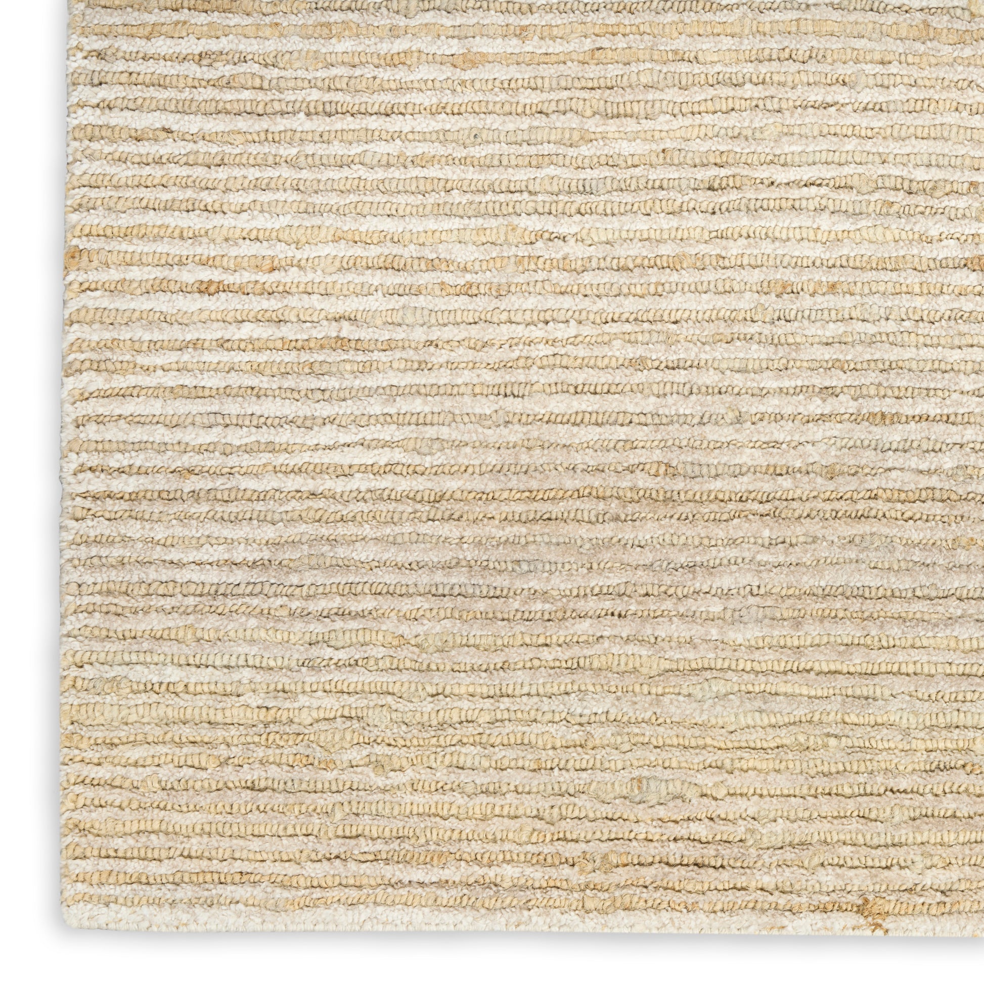 Beige textured looped-pile rug with soft neutral tones, rectangular indoor floor covering.