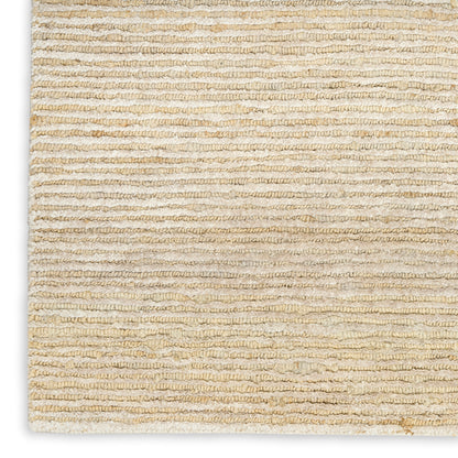 Beige textured looped-pile rug with soft neutral tones, rectangular indoor floor covering.