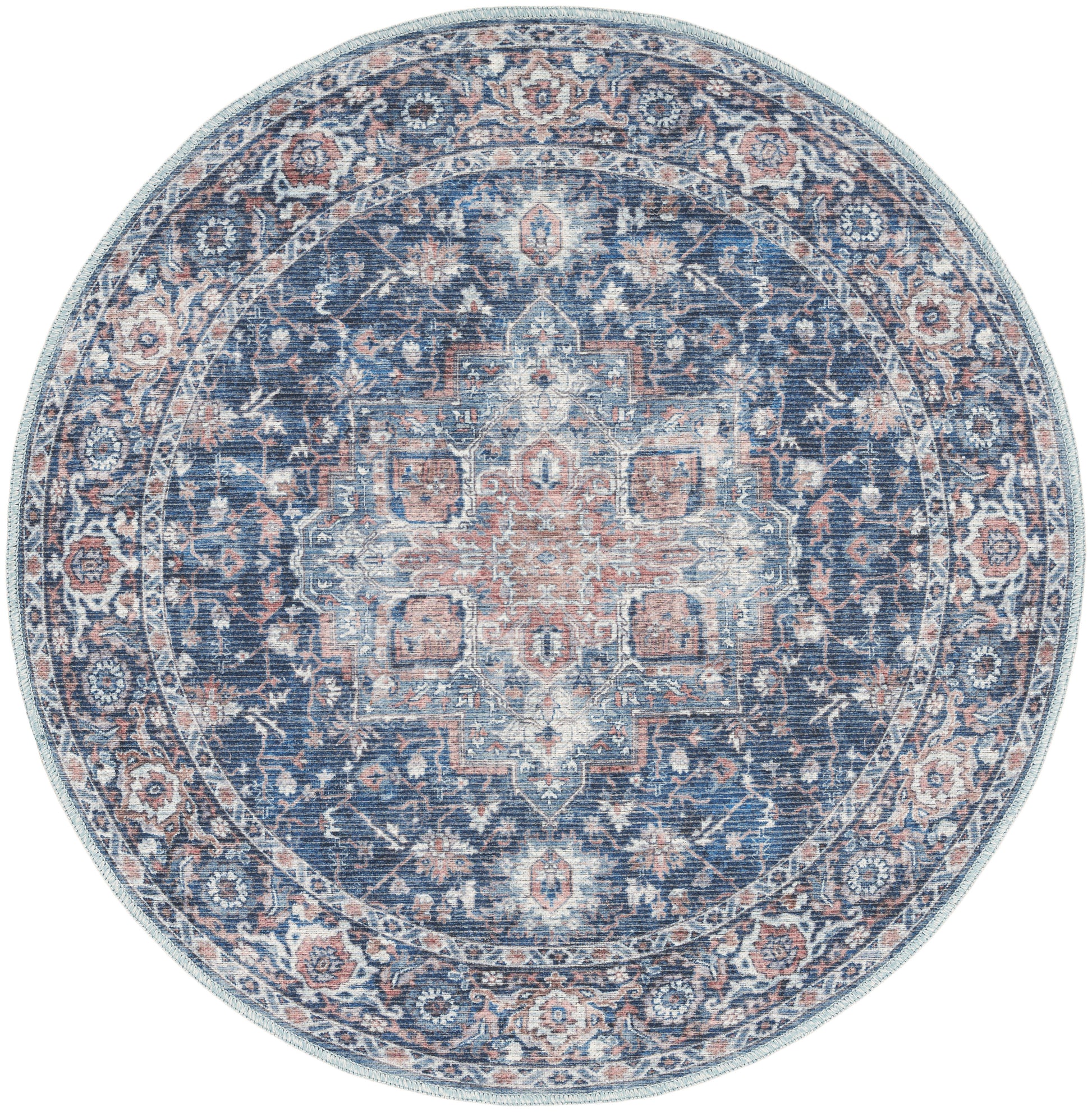 Round Persian-style rug in navy blue with blush pink and ivory, ornate central medallion and floral border.