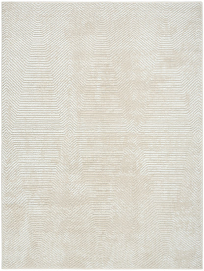 Cream-beige area rug with subtle chevron pattern in a light woven texture.
