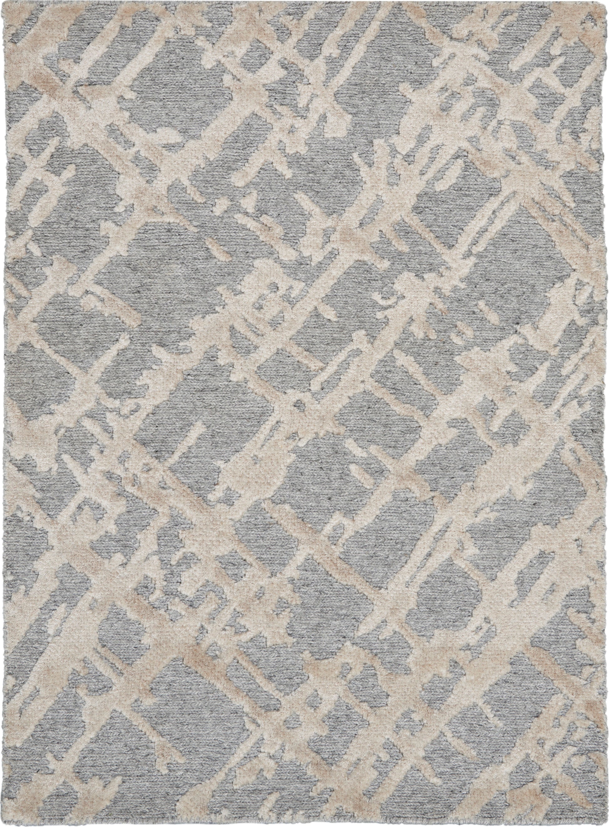 Rectangular modern area rug with gray field and ivory lattice pattern; low-pile, versatile for living room.