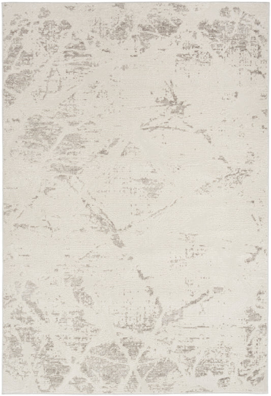 Cream flat-weave rug with subtle gray marbled pattern; modern neutral floor covering.