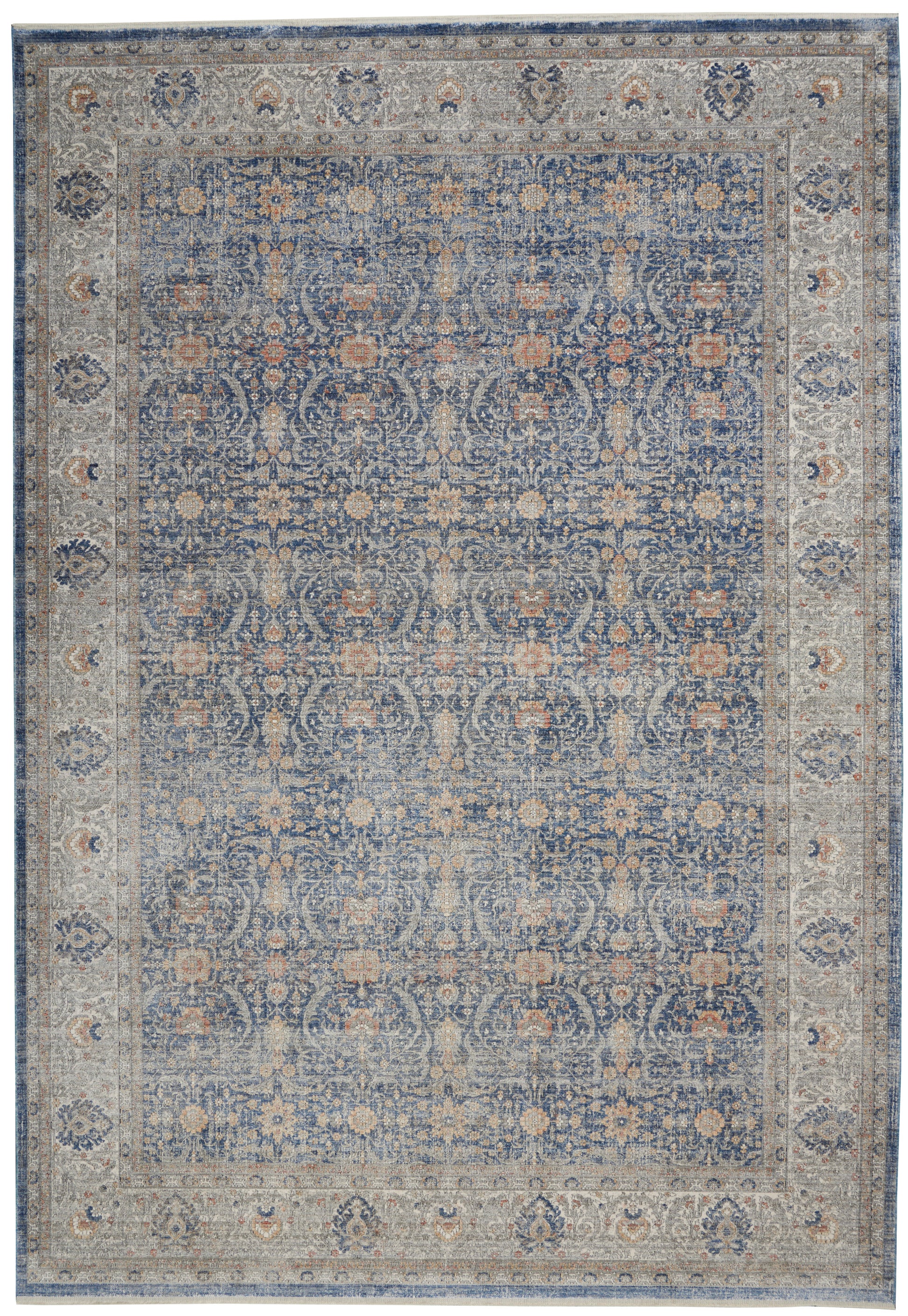 Blue-toned oriental rug with cream border and intricate floral scrollwork.