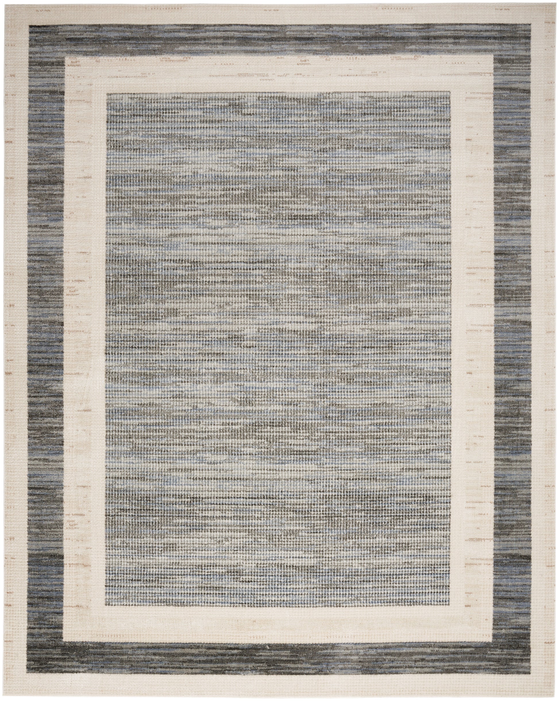 Rectangular woven area rug with navy blue outer border, cream inner frame, and a blue-gray textured center.