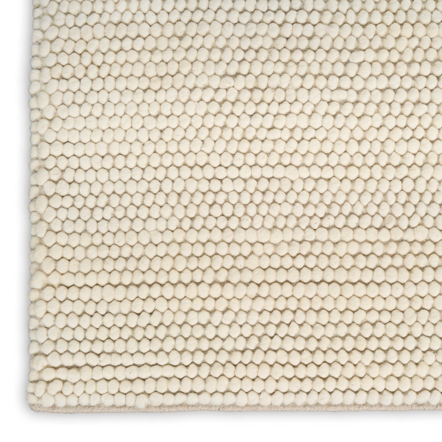 Cream looped cotton rug close-up with tight woven texture; rectangular 9' x 12' rug.