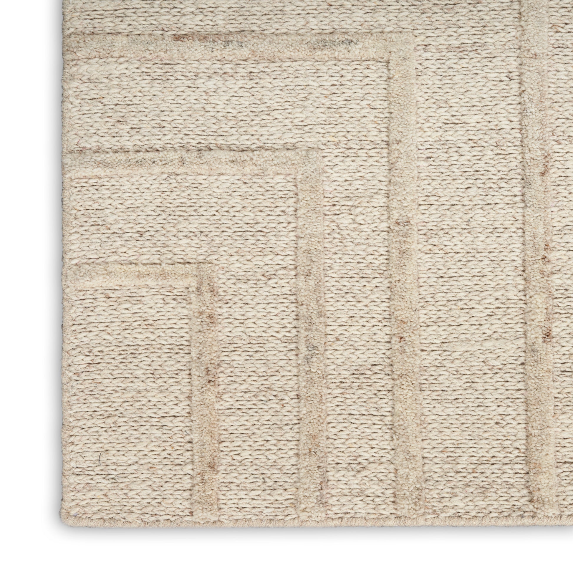 Cream-beige woven rug with a soft textured surface and geometric rectangle border pattern; versatile for living spaces.