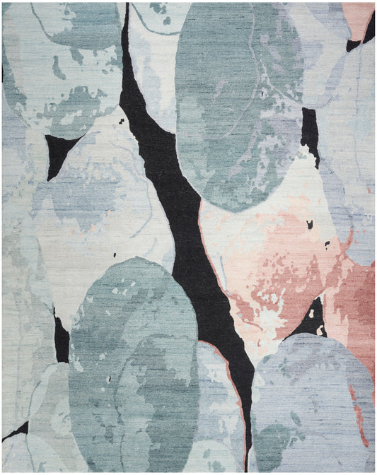 Abstract area rug with teal & blue-green leaf shapes, bold black lines, & peach accents.