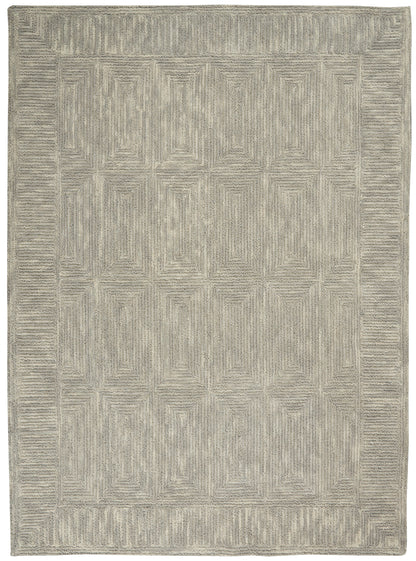 Rectangular grey rug with raised geometric square motif, neutral tones and textured border.
