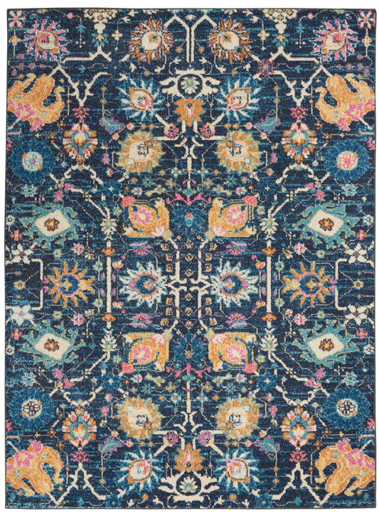 Rectangular navy-blue oriental rug with ivory lattice and vivid yellow, pink, teal floral motifs.