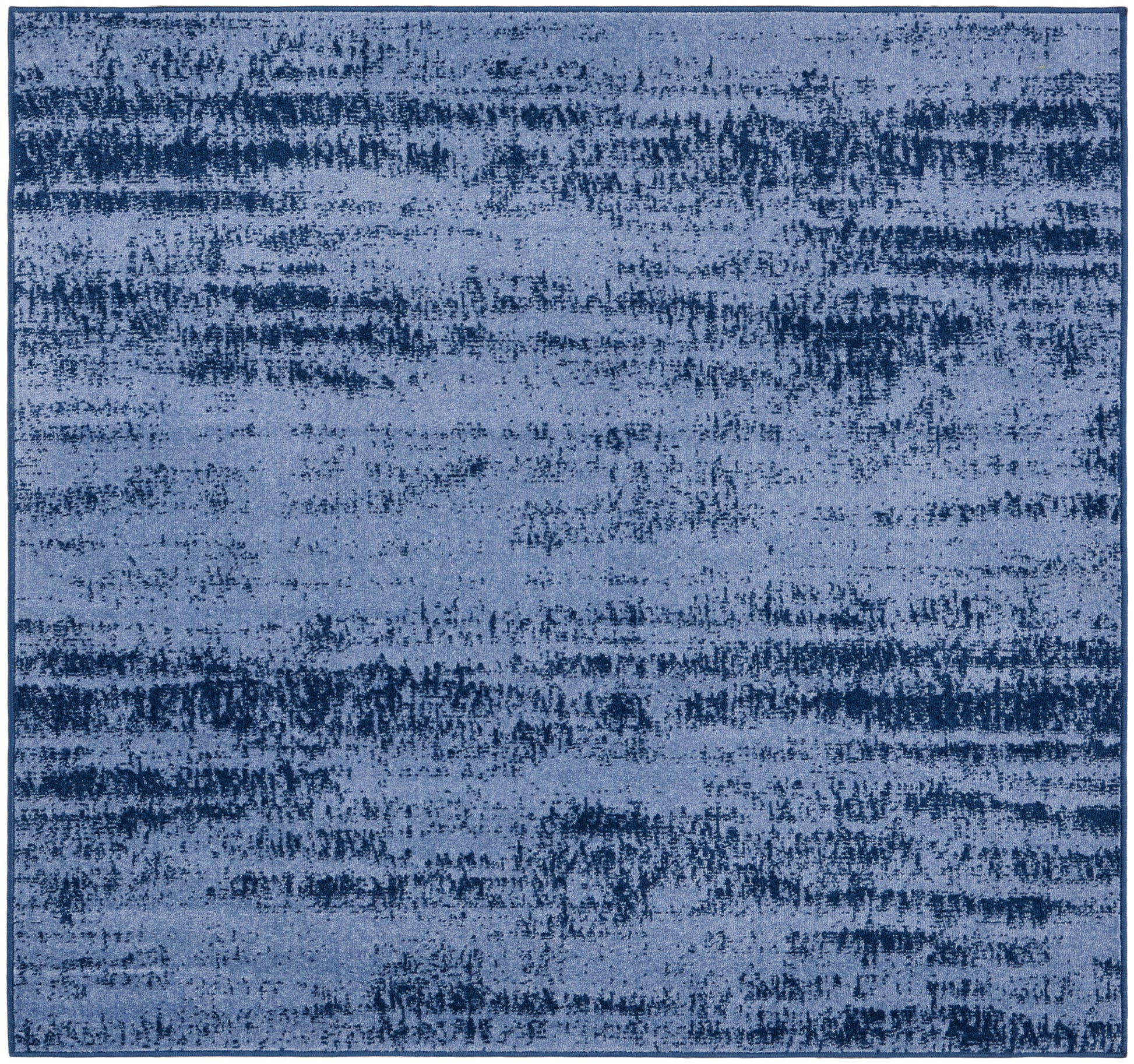 Blue abstract area rug with distressed, brushstroke pattern in dark navy tones; rectangular, plush, modern decor.