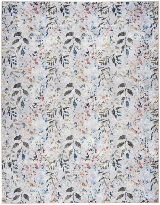 Pastel floral rug with hanging branches, blue-green leaves and tiny pink blossoms on a light gray-beige background.