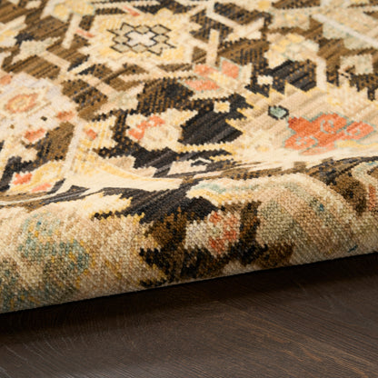 Beige and cream geometric kilim runner with black, peach and blue accents; flat-weave decorative floor covering.
