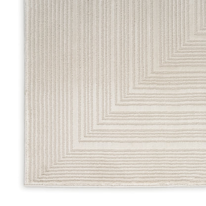 Beige textured rug featuring cream concentric square patterns and subtle raised lines for a geometric modern look.