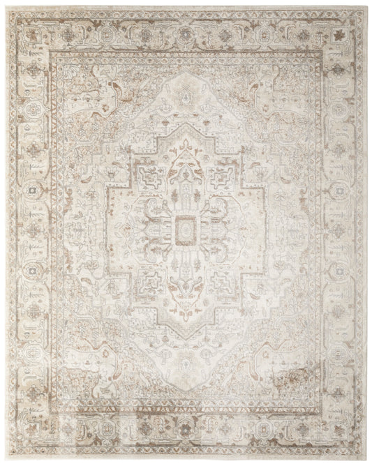 Cream-tan distressed Persian-style area rug with central medallion and ornate border.