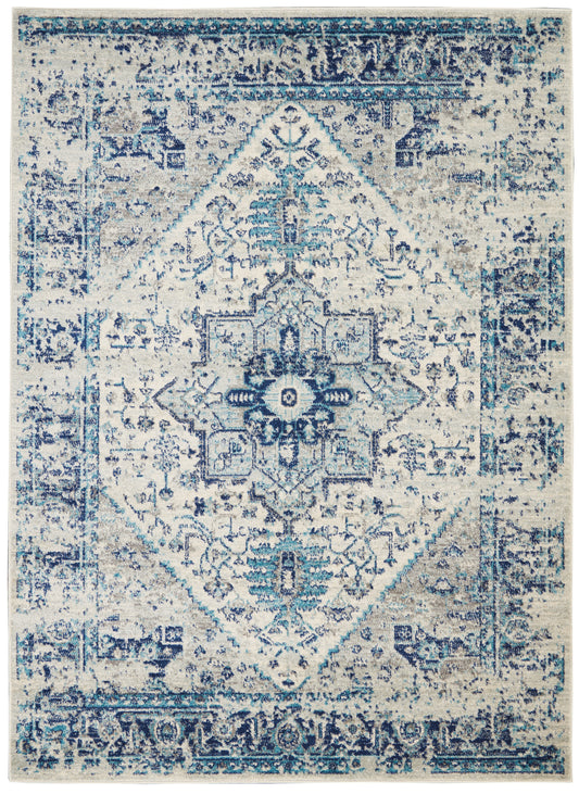 Blue & ivory distressed oriental area rug with central diamond medallion & ornate border.