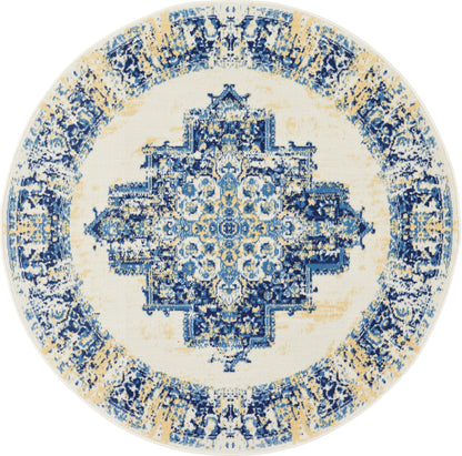 Round area rug in blue and cream tones with an intricate distressed oriental medallion pattern.