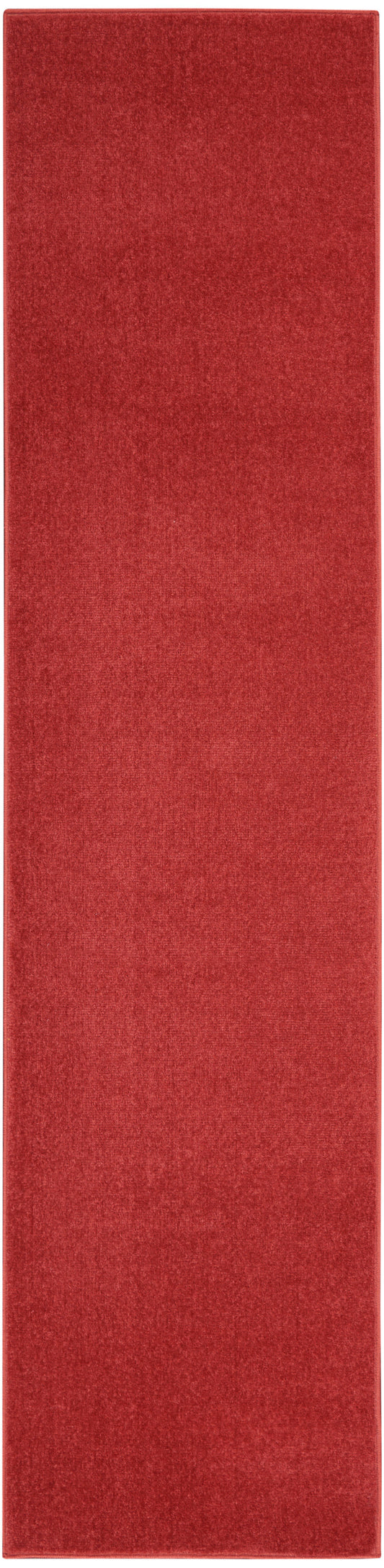 Red velvet-textured rug runner, long rectangular hallway mat with plush surface.