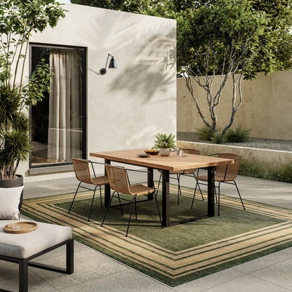 Modern 6' x 9' rug on the floor with a subtle pattern.