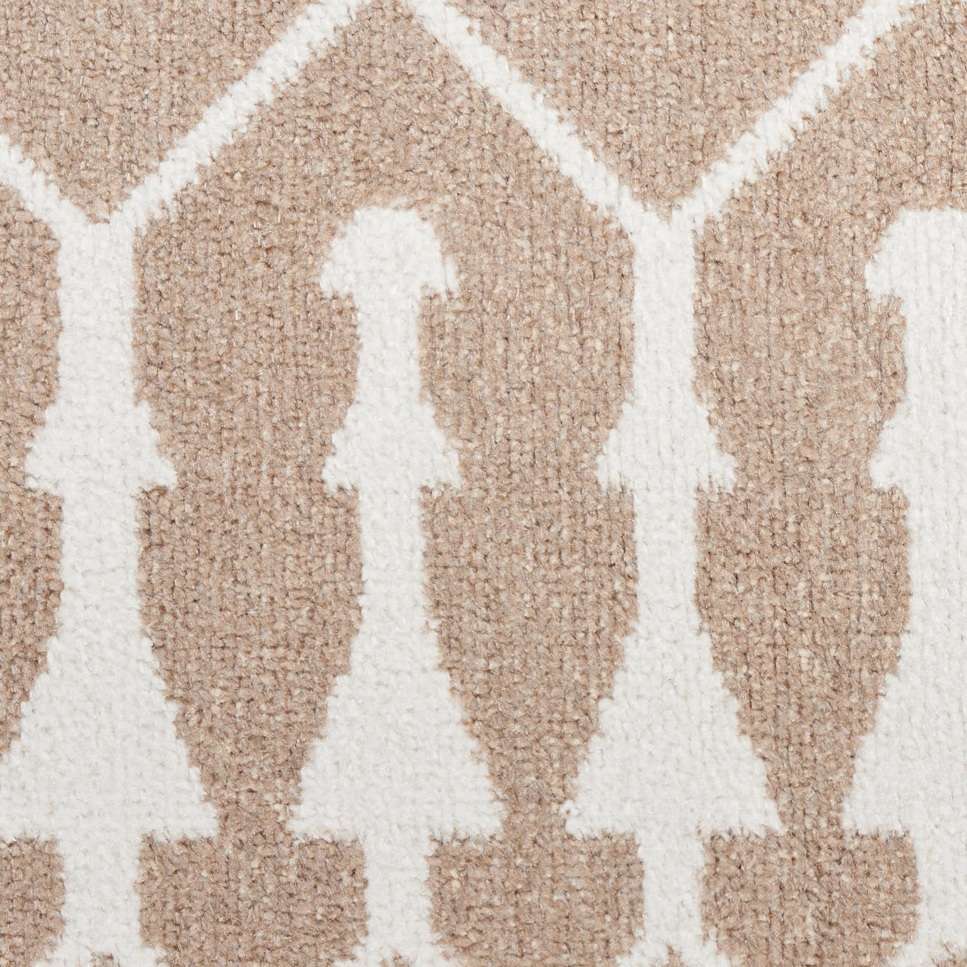 Tan & ivory tufted runner rug with a repeating geometric tree/chevron pattern in a soft, textured pile.