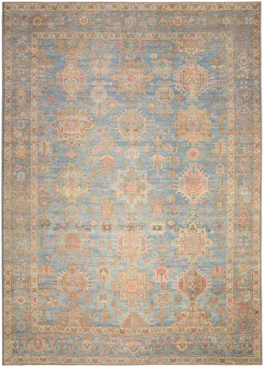 Rectangular traditional area rug with light blue field, beige floral motifs and ornate beige border; vintage finish.