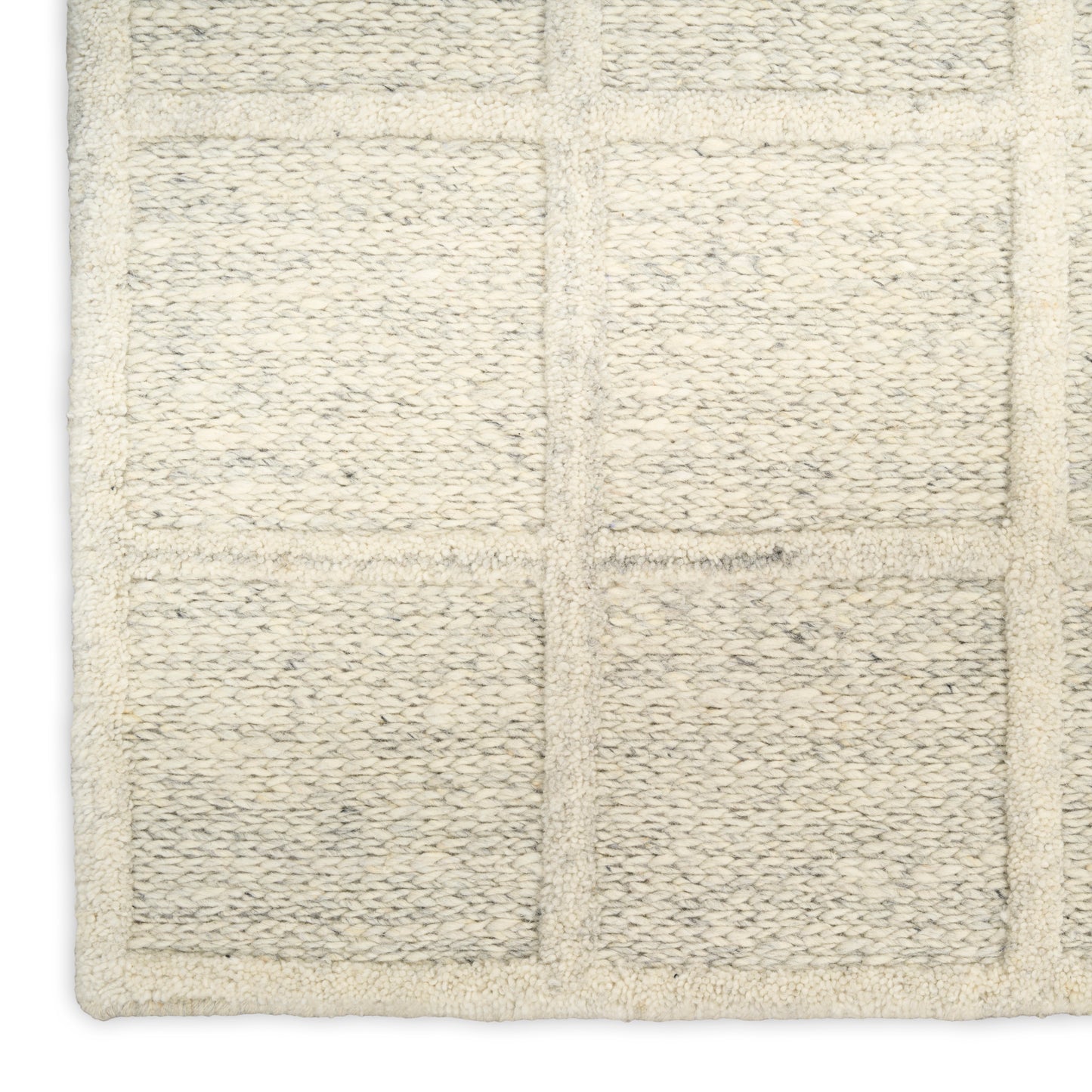 Cream rug with a grid of square tufted panels and plush, textured loops; measures 10' x 14'.